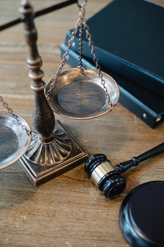 symbols-of-justice-and-law-on-table-of-judge